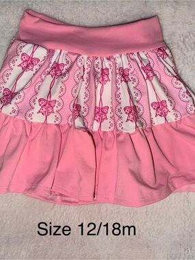 Handmade Pink Bow-Print Tiered Skirt with attached shorts underneath.